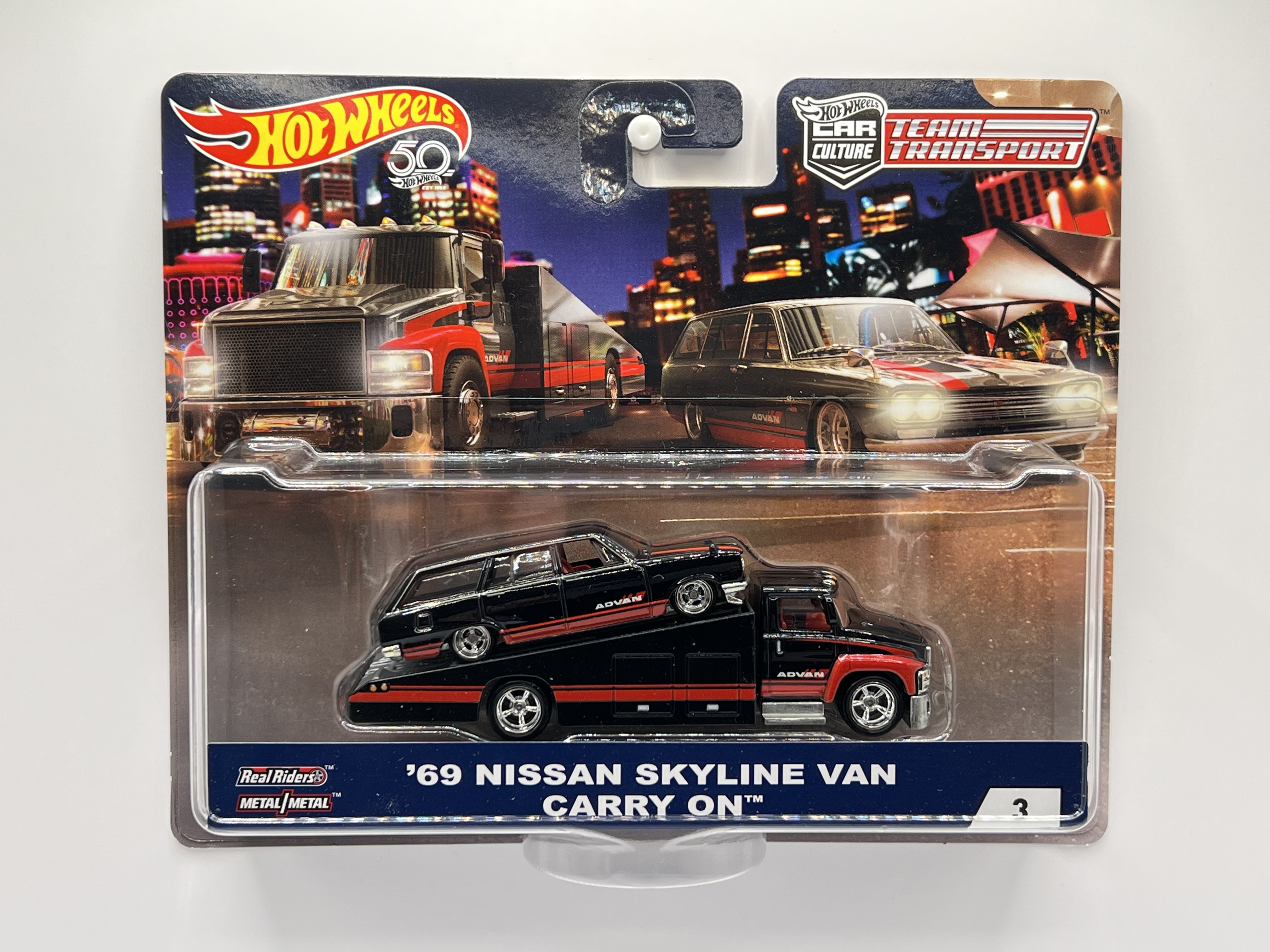Hot Wheels Premium Team Transport #3 '69 Nissan Skyline Van Advan