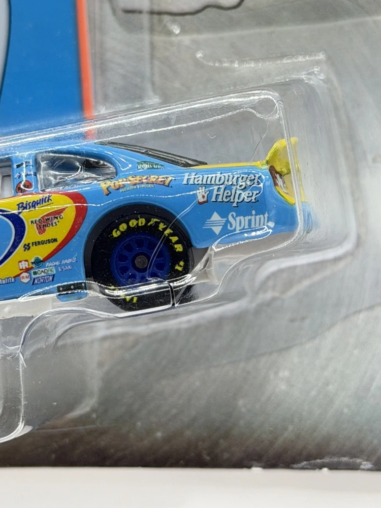 Hot Wheels Pit Board Series #43 John Andretti Cheerios Nascar - PRASKLÝ BLISTER
